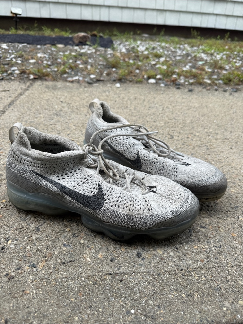 Nike Light Gray Flyknit Sneakers with Dark Gray Swoosh